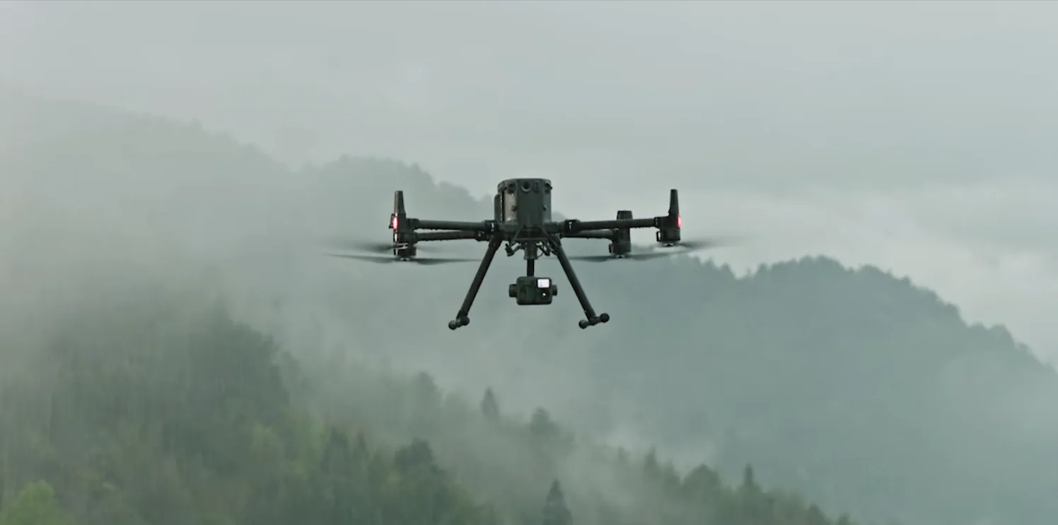 DJI Matrice 350 RTK flying a LiDAR survey over forest